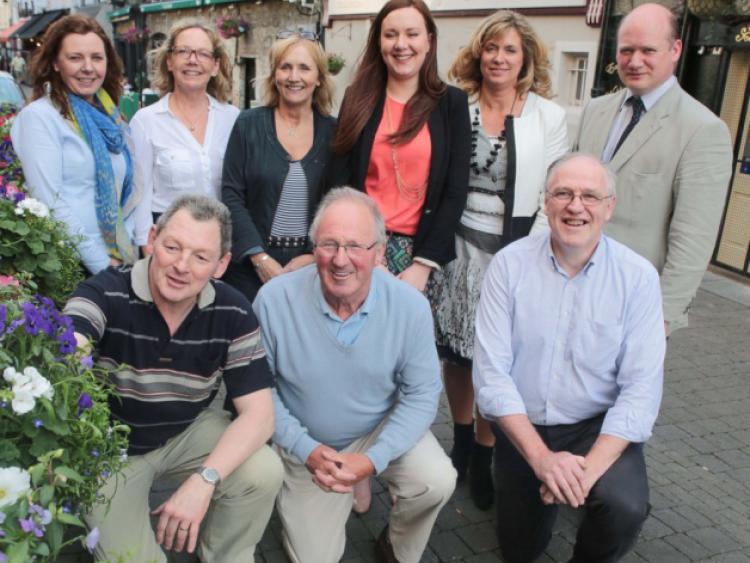 St Kieran's Street traders last Thursday. Pictured are (back): Rita Brennan, Nicky Flynn, Liz Walsh, Siobhan Forrest, Sally Hennessy and David Fitzgerald. Front: Martin Crotty, Sean Leahy, Kieron Bollard. Photo: Pat Moore.