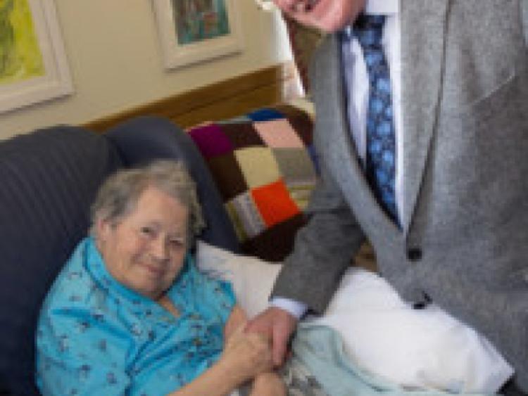29/05/2013: President Michael D. Higgins presented 100 year old May Bambrick, originally from Maddoxtown in Co Kilkenny, with her cheque and letter which traditionally comes from the President of Ireland to mark a hundreth birthday, during his visit to St Columba's Hospital in Thomastown on Monday afternoon. Photo: Pat Moore.