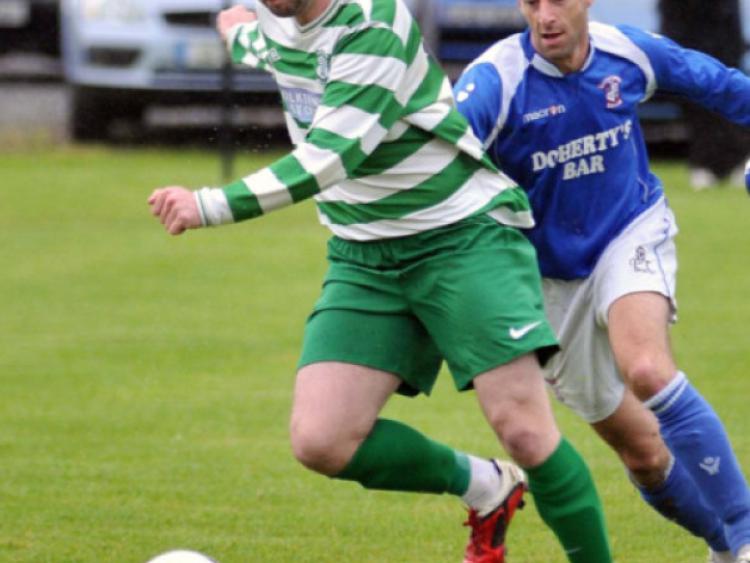 David Grincell (Evergreen A) in control with Geoffrey Brennan (Freebooters A) in pursuit. Photo: Michael Brophy