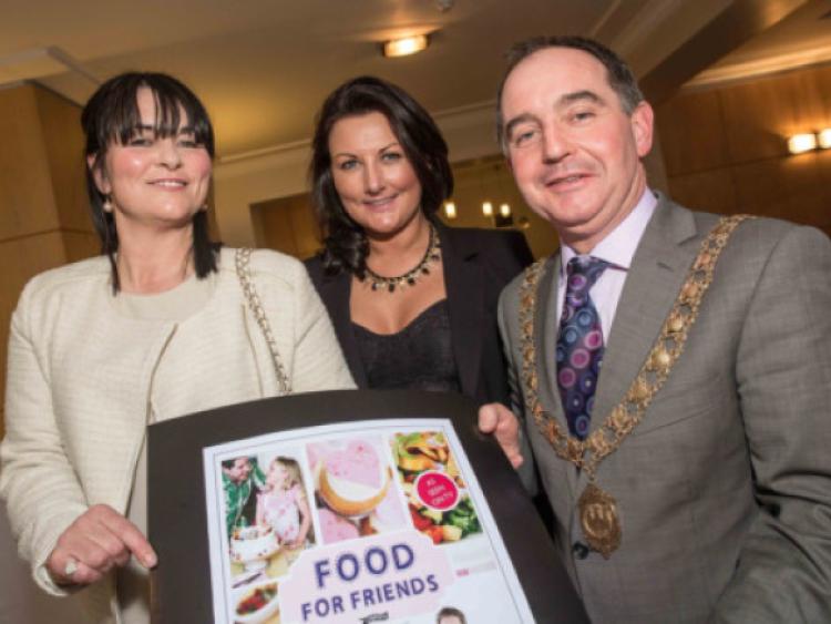 Mayor Sean " hArg�in, Marie Rafferty and Caroline Phelan pictured during the launch of chef Edward Hayden's third book 'Food for Friends' at the Springhill Court Hotel last Friday night. Photo: Pat Moore.
