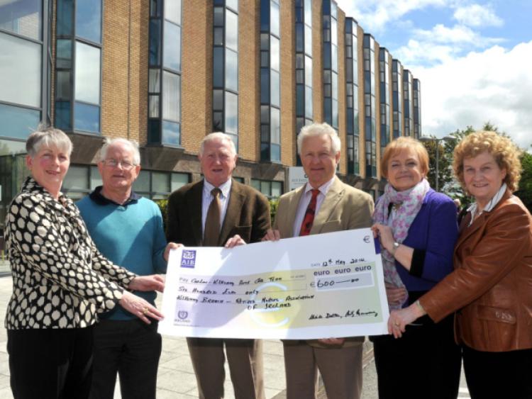 The Retired Nurses Asssociation Of Ireland Kilkenny Branch pictured presenting a cheque for 600 euro to Mr. Ian Wilson, Carlow/Kilkenny Home Care Team. The money is the proceeds from their annual Mass & Coffee'Tea Morning. From left, Geraldine Connolly, John Comerford, Secrtetary; Nicky orrissey, Chairman; Mr. Ian Wilson, Margaret Noonan and Bernadette Lawlor. Picture: Michael Brophy.