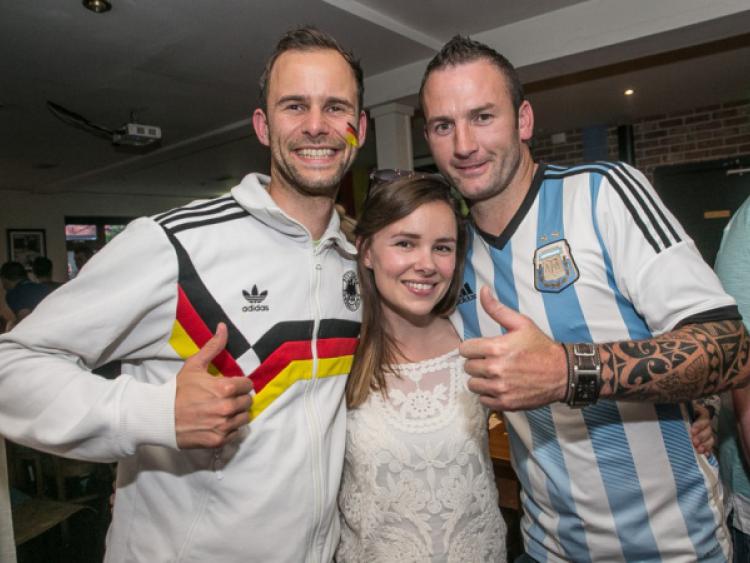 Sebastian Tretter and Sarah O'Doherty were supporting Germany while Tom Dowling was supporting Argentina at Billy Byrne's on Sunday night. Photo: Pat Moore.