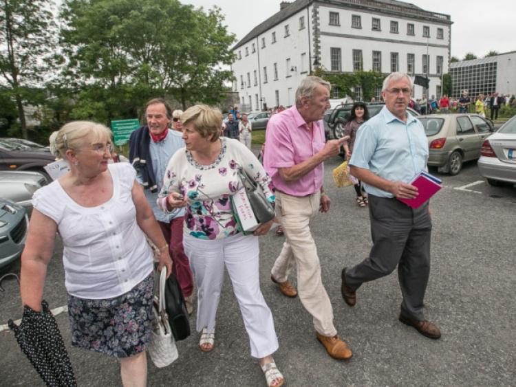 26/07/2014: Former Irish rugby international star, Willie Duggan, who is also a successful businessman in the city was asking Cllr Pat Dunphy, with Councillors Mary Hilda Cavanagh and Fidelis Doherty how they had reached the decision at the meeting. Photo: Pat Moore.