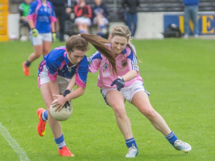 Caoilfhionn O'Hagan (Erins Own) and Lynn Boland (Thomastown) pictured during the Kilkenny Junior Championship Final at Nowlan Park last Sunday morning. Photo: Pat Moore.