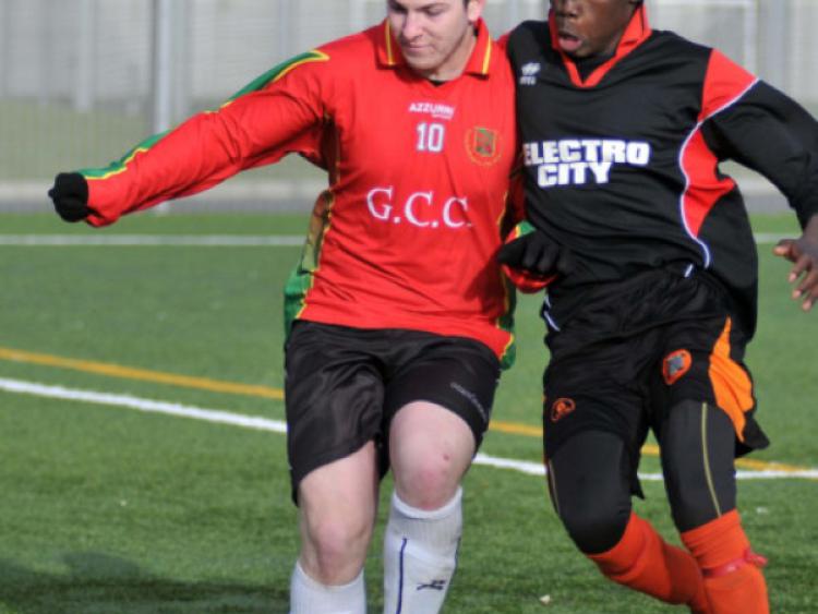 Gabriel Ayuri (Callan CBS) challenges Luke O Corcorain (Gaelcholaiste Carlow) for possession during their Leinster U-19 final. Photo: Michael Brophy