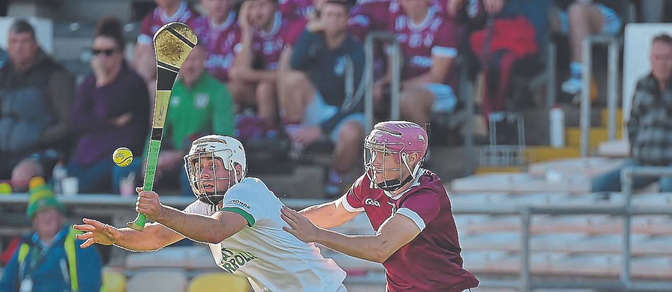 Jack Nolan (O’Loughlin Gaels) reaches out as Dara Glynn (Clara) makes a tackle in Sunday’s SHC clash in UPMC Nowlan Park.  Picture: Willie Dempsey