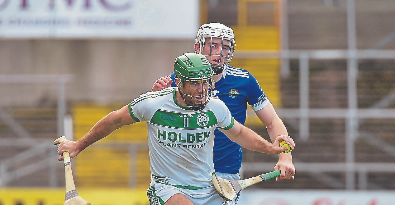 A determined Eoin Cody drives forward past the challenge of Thomastown’s Rory Connellan.