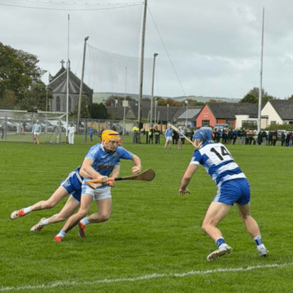 Graigue Ballycallan defender Billy O'Neill brings the ball out of defence.