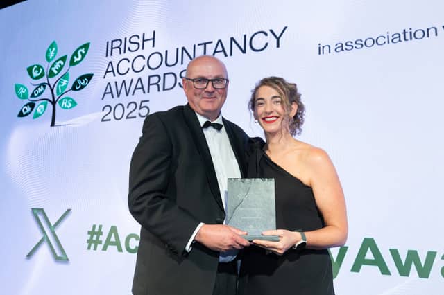Cora Phelan from Taxback International holding the trophy for the Client Service Award at the Irish Accountancy Awards 2025