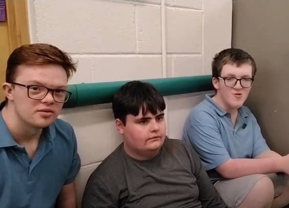 Fionn, Luke and Michael acting in their short film, 'Closing Date'