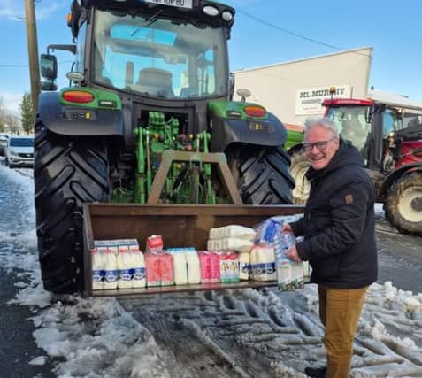 Robert 'Bob' Moore receiving supplies for his XL Gala Shop in Kells, County Kilkenny / Picture: Brian Ireland