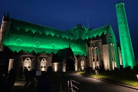 St  Canice's Cathedral lit up in green