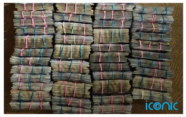 Bundles of cash seized during the Jersey investigation