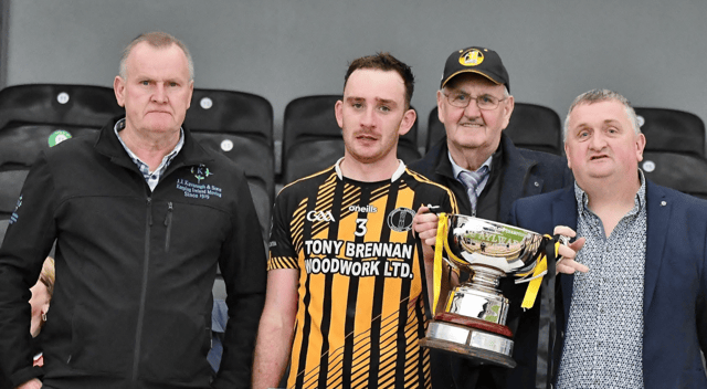 Freshford captain Criomhthann Bergin accepts the cup. Picture: Willie Dempsey