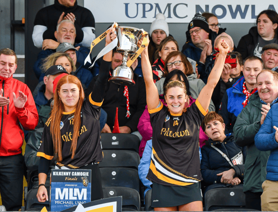 Aoife Doyle and Katie Power lift the trophy after Piltown's first senior title win on Sunday. Picture: Billy Culleton