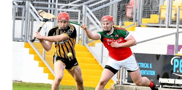 James Maher has a shot at goal hooked by Adam O’Connor. Picture: Willie Dempsey