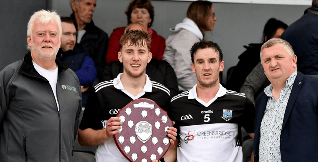 Mullinavat’s Ian Duggan and George O’Connor receive the Senior Shield from PJ Kenny and Vincent Kenrick, St Canice’s Credit Union. Picture: Willie Dempsey