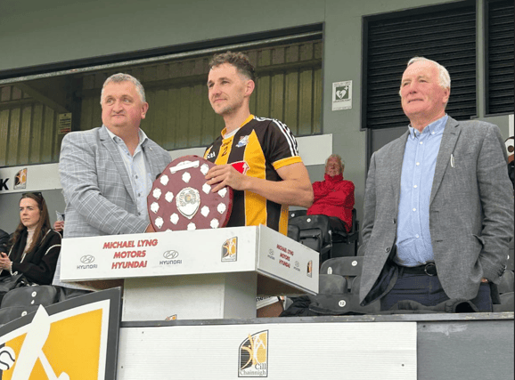 Danesfort's Darren Booth is presented with the IHL Shield by PJ Kenny, Kilkenny Co Board chairman