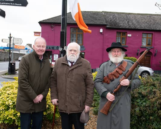 The Easter Sunday Commemoration celebrations were held in Freshford. Michael Burke, Ballylarkin (centre) raised the tricolour during the ceremony Picture: Terry Campion