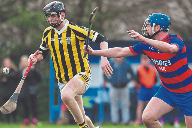 Conor Hennessy (Tullogher-Rosbercon) deftly works the ball forward during Saturday’s Leinster clash with Colt-Shanahoe. Hennessy was the main scoring threat for the Kilkenny champions.