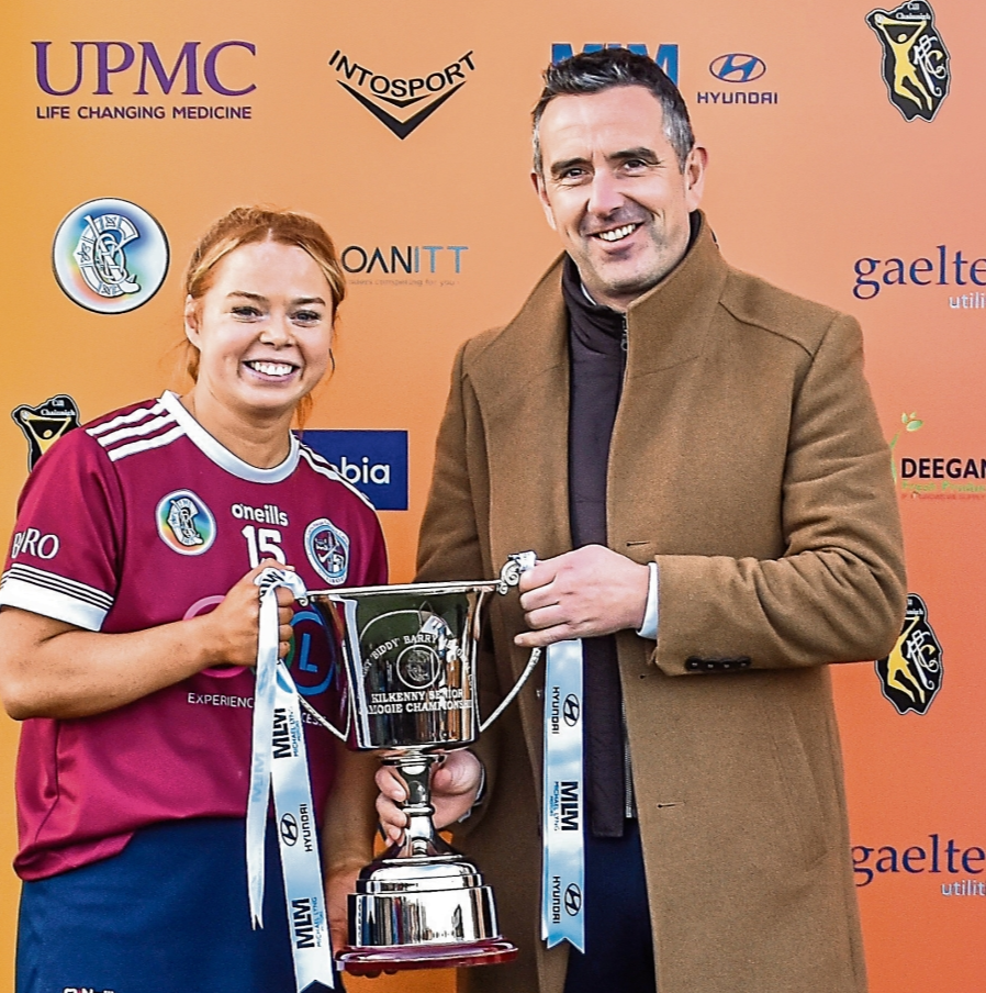 Dicksboro captain Jenny Clifford is presented with the senior county silverware by Neil Lyng (sponsor). Picture: Billy Culleton