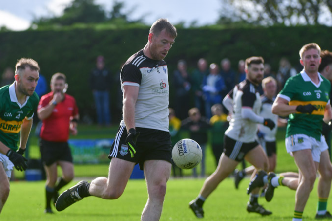 Mullinavat’s Michael Malone brings the ball forward during his side’s Leinster Championship defeat to Laois side Ballylinan in Stradbally on Saturday afternoon.