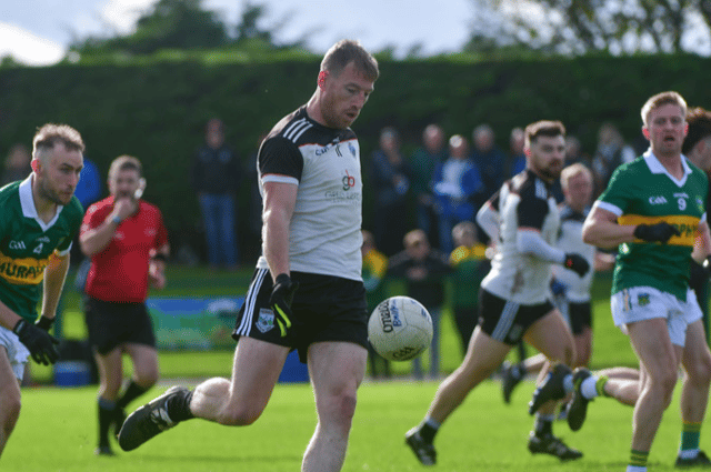 Mullinavat’s Michael Malone brings the ball forward during his side’s Leinster Championship defeat to Laois side Ballylinan in Stradbally on Saturday afternoon.