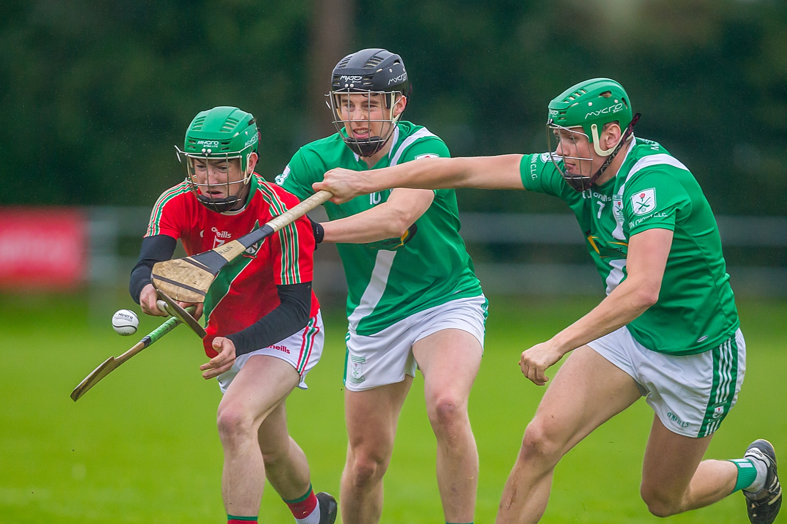 St  Martin’s corner forward Jamie Morrissey is tackled by a pair of Moncoin defenders. Picture: Mark Desmond