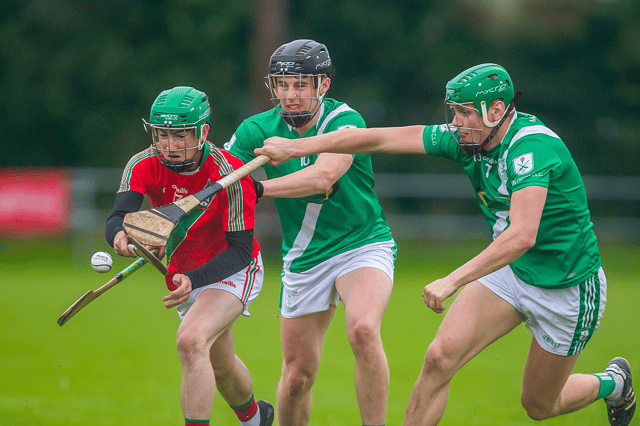 St Martin’s corner forward Jamie Morrissey is tackled by a pair of Moncoin defenders. Picture: Mark Desmond