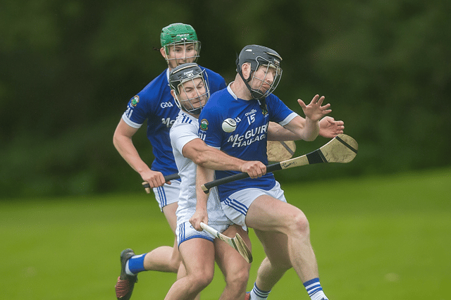 Thomastown’s Robbie Donnelly is wrapped up by a Fenians challenge. Picture: Mark Desmond