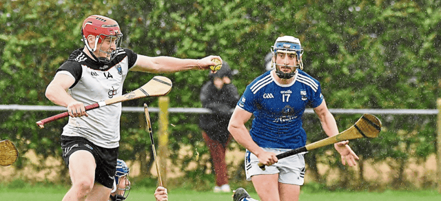 Mullinavat’s Oisin Knox heads for goal as Declan Dunne (Erin’s Own) closes in during their senior hurling championship first round clash in Danesfort. Picture: Willie Dempsey