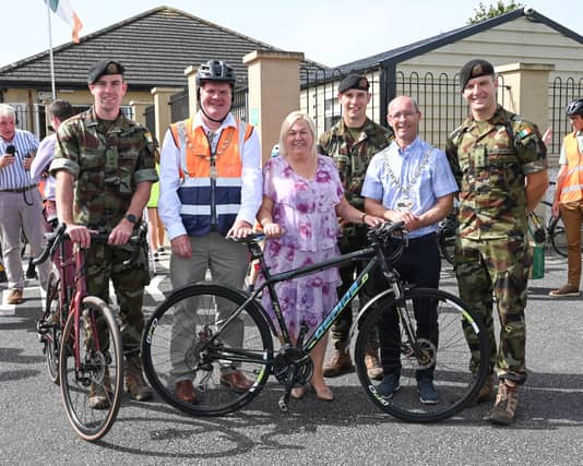 Sheila Donnelly (centre) pictured with Mayor of Kilkenny, Joe Malone (left), Cathaoirleach of Kilkenny County Council, Michael Doyle (right), and members of the Defence Forces PICTURE: Vicky Comerford