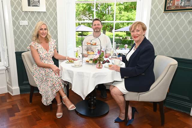 Old friends catch up over afternoon tea at Butler House and Gardens