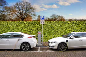 Electric cars being charged - but what happens when the juice runs low?
