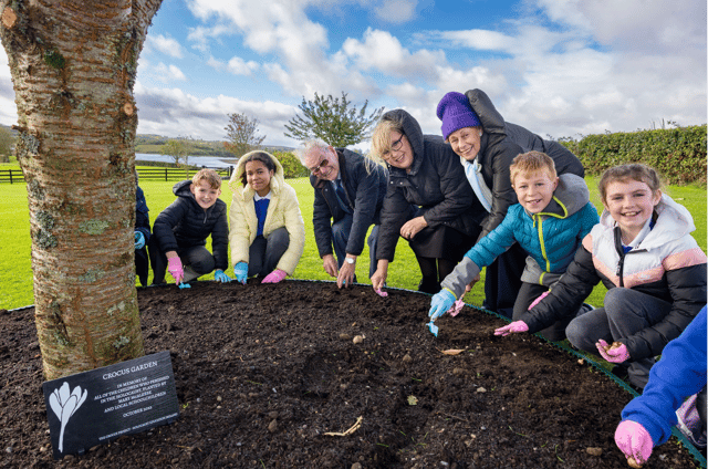 Former President of Ireland, Mary McAleese launched Holocaust Education Ireland’s Crocus Project, in her garden with the help of local schoolchildren