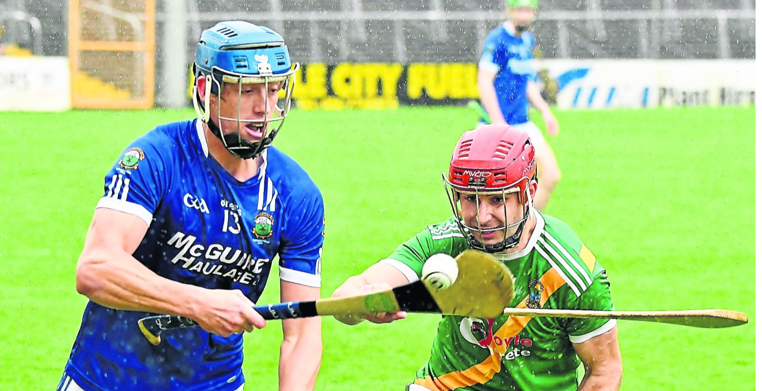 Stephen Donnelly (Thomastown) cleverly flicks the sliotar  away from John Cahill (Carrickshock) during Sunday’s IHC county semi-final.  Picture: Willie Dempsey