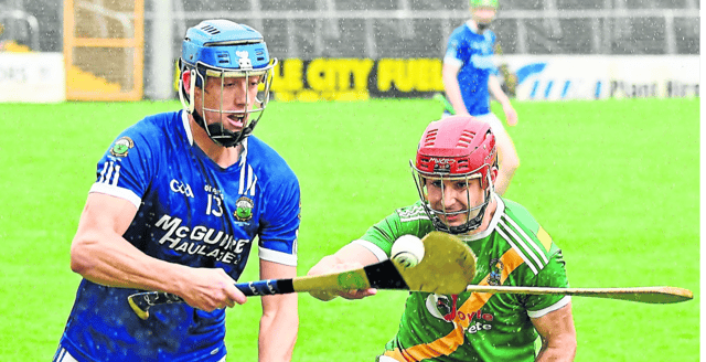 Stephen Donnelly (Thomastown) cleverly flicks the sliotar away from John Cahill (Carrickshock) during Sunday’s IHC county semi-final. Picture: Willie Dempsey
