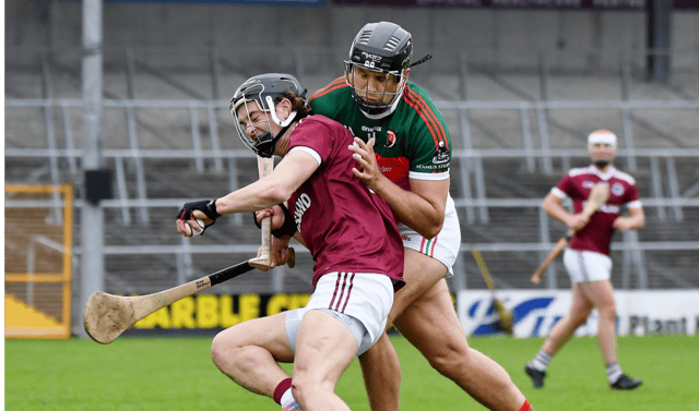 Dicksboro’s Evan Carroll finds difficulty in getting around the challenge of James Stephens’ Niall Brassil during Saturday’s SHC semi-final. Picture: Willie Dempsey