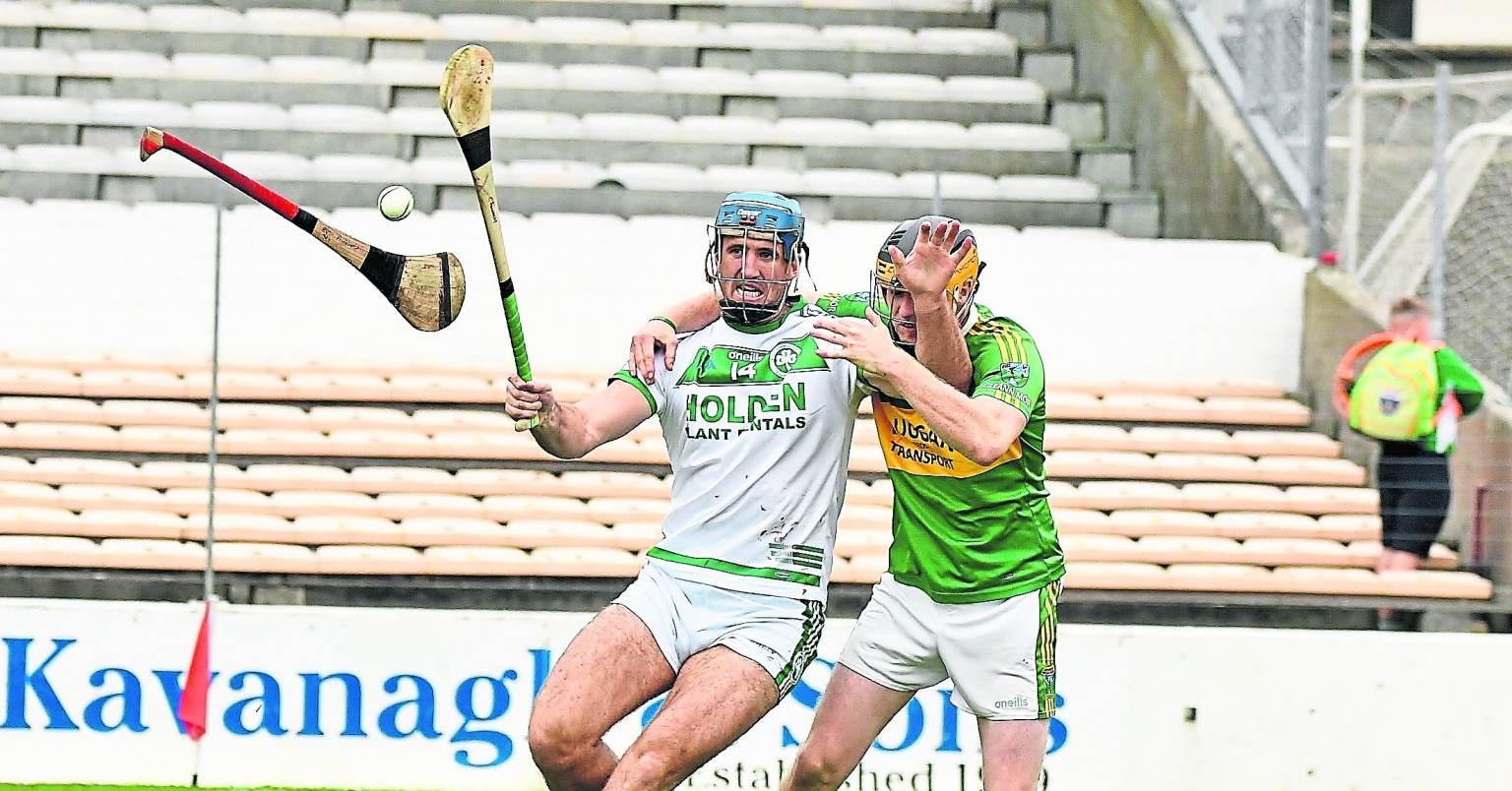 Hurls fly as Colin Fennelly and Eoin Aylward battle for the ball during Sunday’s clash in Nowlan Park.  Picture: Willie Dempsey