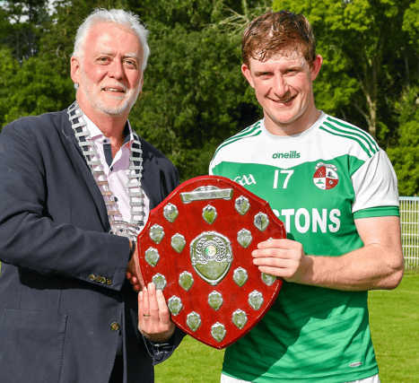 Clara captain Jack Langton receives the league shield after his side’s come from behind success against Dicksboro in Thomastown on Saturday afternoon. Pic: Billy Culleton