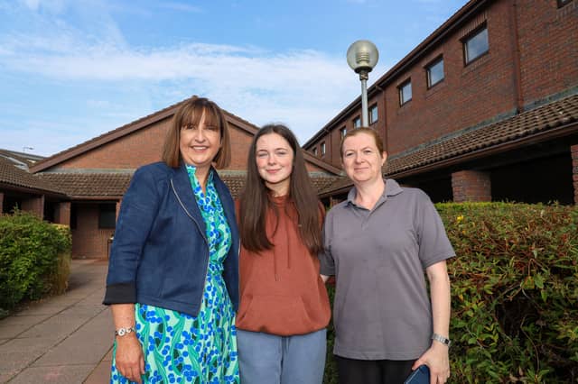 Angela Conroy, Deputy Principal of Coláiste Mhuire Johnstown congratulates Aoife Ryan on Friday morning as she collects her Leaving Cert results with her mother Amanda Ryan. Photo Christine Tobin