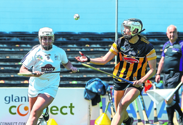 Aisling Curtis (Kilkenny) keeps her eye on the sliotar as Emma Kielty (Kildare) closes in during their All-Ireland intermediate championship clash at UPMC Nowlan Park on Saturday. Pic: Billy Culleton