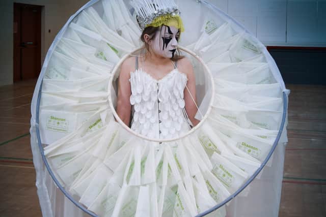 "After we investigated this further, we realized that the main items of waste in the bins were plastic utensils and plastic sandwich bags, so we decided to try to use these items as our main source material for our costume.