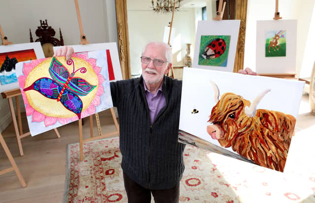 Adjudicator Eoin Butler pictured holding two Kilkenny entries