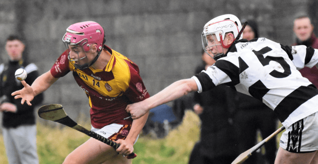 Kilkenny CBS full forward Cillian Hackett tries to get away from the challenge of Richard McEvoy during yesterday's all city clash in Johns Park. Pic: Maurice Walsh
