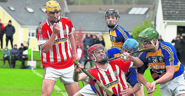 Padraig O’Neill (Young Irelands) holds on to the sliotar despite the strong challenge from Robert Kerwick (John Lockes) during the intermediate hurling relegation final. Pic: Willie Dempsey