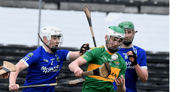 lenmore’s Liam Hennessy takes the ball past a couple of Thomastown defenders. Picture: Willie Dempsey