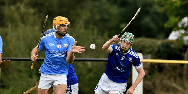 Graigue Ballycallan's Billy Ryan attempts to get a shot away despite the attentions of James Mullins. Pic: Willie Dempsey
