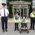 Superintendent Derek Hughes, Cormack Kennedy (9) from Bagenalstown, Cathal Nolan (10) from Newmarket, Garda Lisa Mullins and  Amelia Mulhall (4) from Ballyfoyle