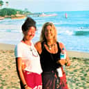 Cathy Hogan with Berry Berenson on Treasure Beach, Jamaica in 2001  